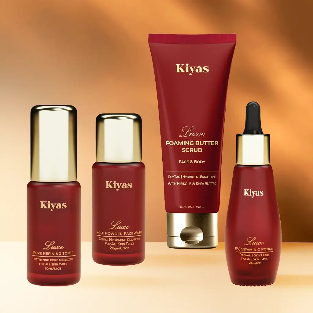 Kiyas skincare products including a tube, bottles, and a dropper on an orange background